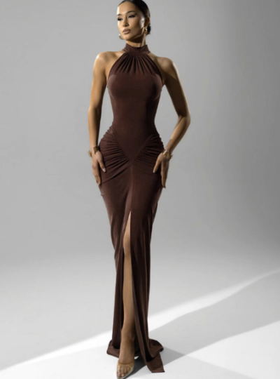 A tight-fitting, low-cut, pleated, slit dress with a long skirt